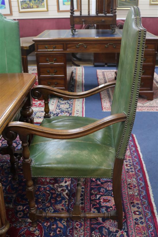 Eight leather studded dining chairs (2 carvers & 6 chairs)